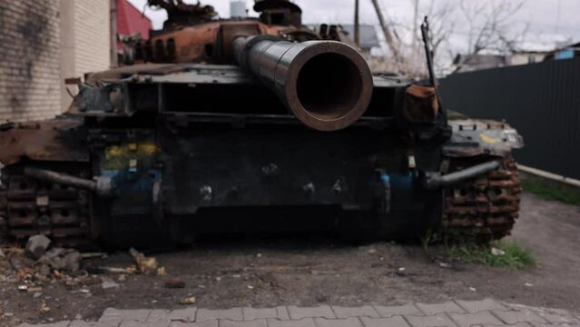 Russian invasion, Combat tank, Russia Ukraine. In course of Russian incursion into Ukraine, battle tank was obliterated amidst urban warfare.