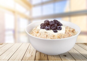 Yogurt and muesli dish with fresh blueberry in bowl