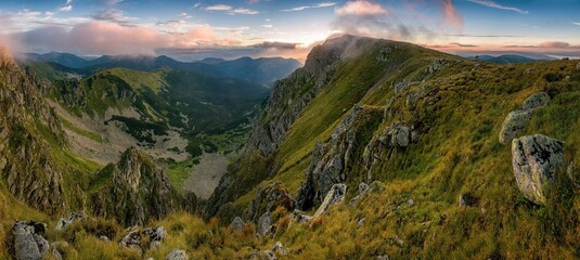 Amazing colors during sunset in Low Tatras, Dumbier and Chopok peak, anoramic ultra wide view 