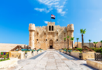 Citadel of Qaitbay, famous medieval fort built on the place of Lighthouse of Alexandria, Egypt travel landmark - obrazy, fototapety, plakaty
