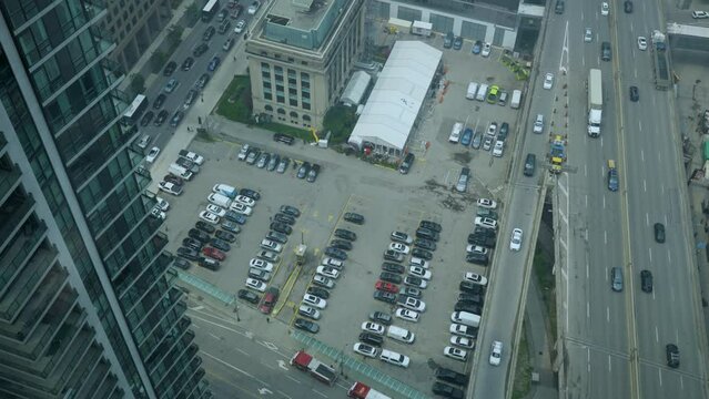 Panning shot, looking down on Toronto Gardiner Expressway downtown