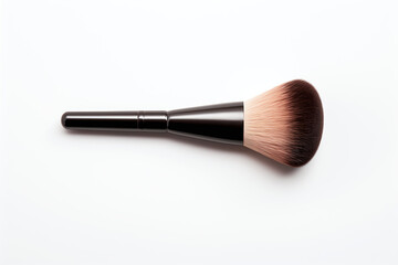 Makeup brush on a light plain background