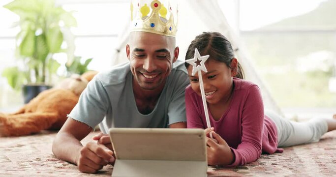 Tablet, games and father with girl child on a bed with love, bond and fun while playing with a crown in their home. Online, e learning and kid with parent in bedroom for streaming, movies or playing