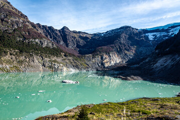 Manso Lake, generated by the melting of the Ventisquero Negro glacier, due to global warming, at the base of Cerro Tronador. It's emerald green due to the sediment content with copper sulfate.