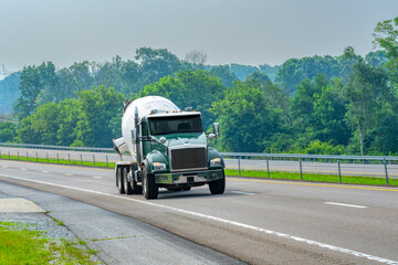 Fototapeta na wymiar Concrete Truck On Tennessee Highway in Hazy Weather