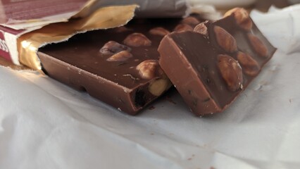 Chocolate bar for whole hazelnuts in foil