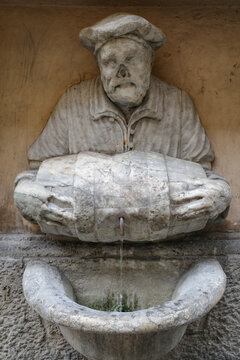 Rome, Italy - 26 Nov, 2022: Fontana del Facchino - Fountain of the Laborer - by Jacopo Del dating back to 1580