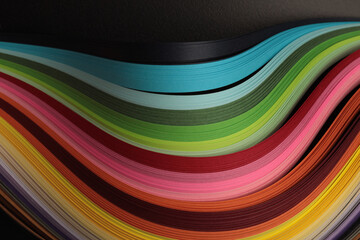 Color rainbow strip wave line paper on black. Abstract texture background.