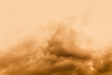 A large storm formed, powdered dust and sand on the ground were blown into the clouds, causing the orange glow to look horrible. extreme weather events. - obrazy, fototapety, plakaty