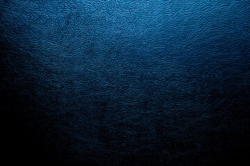 The surface of the black leather is Dark shaded by blue light.  Embossed pattern for luxury...
