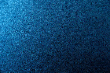 The surface of the black leather is Dark shaded by blue light.  Embossed pattern for luxury decoration or input text. - obrazy, fototapety, plakaty