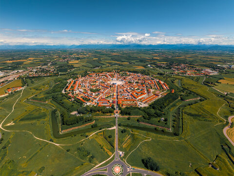Palmanova is an Italian town what  founded in 1593, features a unique star-shaped layout with well-preserved Renaissance architecture and historic charm.