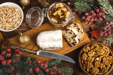 Christmas stollen on wooden background. Traditional Christmas festive pastry dessert. Holiday...