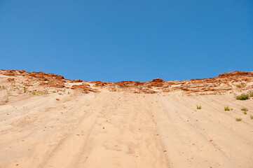 sand pit against the blue sky