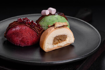 Delicious sweet colorful mochi desserts or ice cream with rice dough and toppings