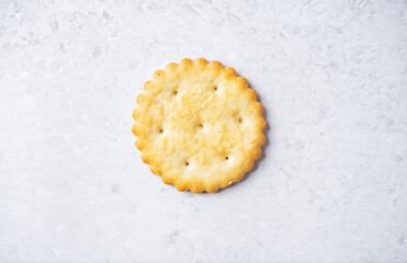 Graham cracker with salt on a white isolated background