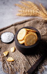 Graham cracker with salt on a white isolated background