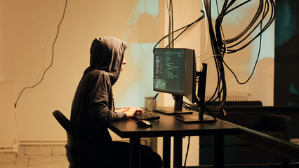 Female hacker committing cyberattack on server firewall, gaining access to steal government...