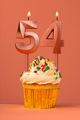 Birthday cake with candle number 54 - Coral fusion background