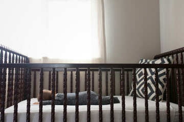 baby sleeping in a crib