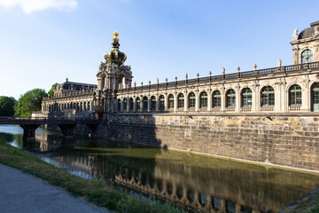 Fototapeta na wymiar Facade of Crown gate and moat at Zwinger, Zwingergraben, Langgalerie, Dresden, Saxony, Germany, Europe