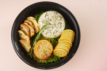 Artisanal Cheese Platter: A Delectable Assortment of Cheeses, Bread, and Crackers for Effortless Entertaining