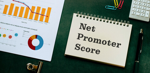 There is notebook with the word Net Promoter Score. It is as an eye-catching image.