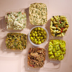 Fiesta Flavor Fusion Platter: A Medley of Ready-to-Serve Party Snack Trays with Olives, Chips, Pasta, Shredded Meat, Tuna, and Chipotle Chicken