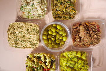 Fiesta Flavor Fusion Platter: A Medley of Ready-to-Serve Party Snack Trays with Olives, Chips, Pasta, Shredded Meat, Tuna, and Chipotle Chicken