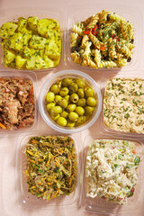 Fiesta Flavor Fusion Platter: A Medley of Ready-to-Serve Party Snack Trays with Olives, Chips, Pasta, Shredded Meat, Tuna, and Chipotle Chicken