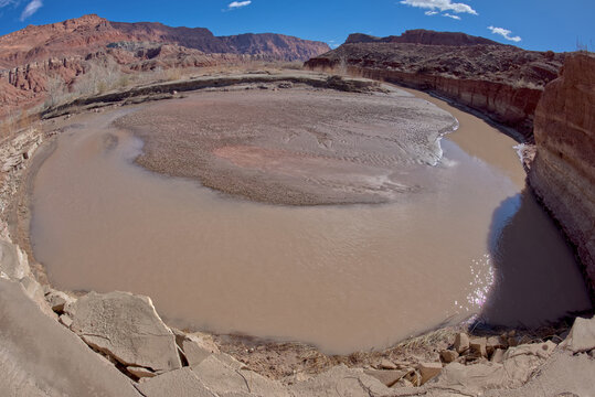 The Paria River flowing through Paria Canyon in the Glen Canyon Recreation Area Arizona.