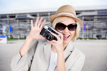 Young woman travelers take a photo with camera