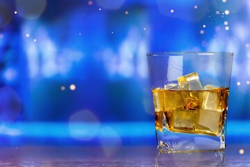 a glass of whiskey alcohol drink in the bar