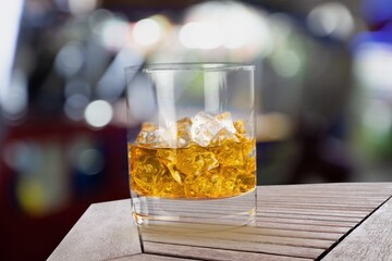 a glass of whiskey alcohol drink in the bar