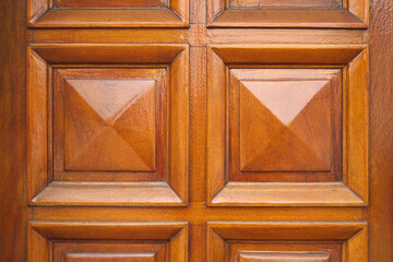 Openwork and varnished wood background with geometric square shapes