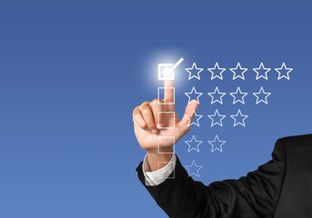 Business Man hand and five star sign to rating