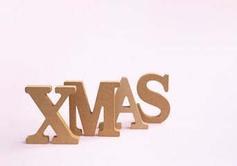 Wooden XMAS Word. Minimalist composition.