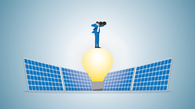 Visionary businessman uses binoculars on light bulb powered by solar cells. ESG, Renewable, Alternative, Green energy, Sustainable Environmental policy, Net zero emission, Carbon footprint reduction.