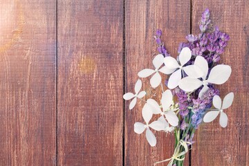Fototapeta na wymiar Beautiful aroma Lavender flowers on wooden background.