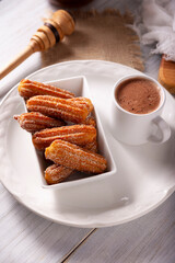 Churros. Fried wheat flour dough, a very popular sweet snack in Spain, Mexico and other countries where it is customary to eat them for breakfast or snack accompanied by hot chocolate or coffee.