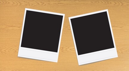 Two Blank retro instant photo frame on desk