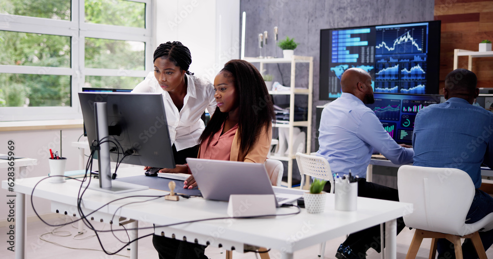 Poster african financial data analysts using dashboard on screens