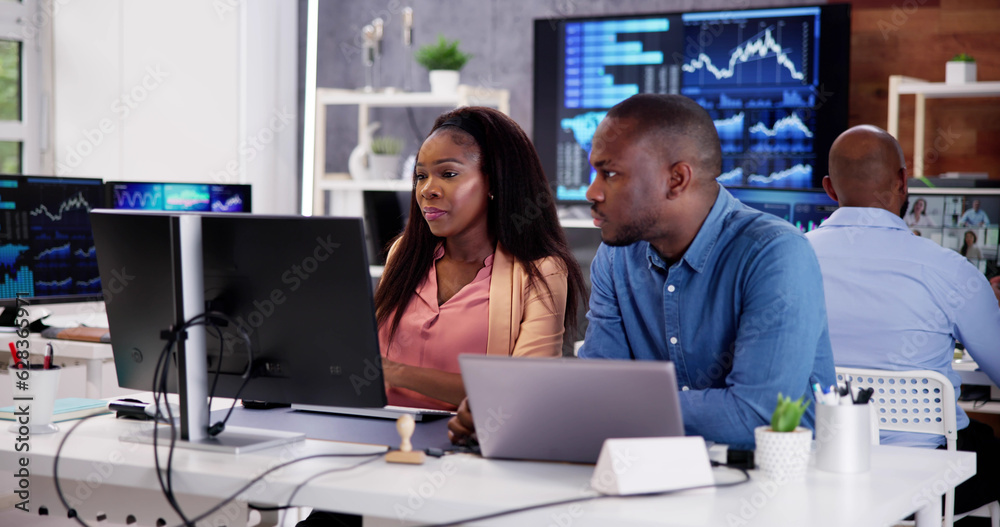 Poster african financial data analysts using dashboard on screens