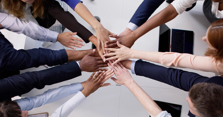 Diverse Business Team Stacking Hand