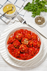 Iowa Ham Balls with tomato sauce in bowl