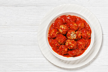 Iowa Ham Balls with tomato sauce in bowl