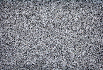 Texture with small stones for use as a background or wallpaper