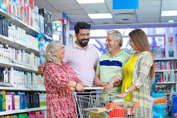 Indian family shopping together at super market.