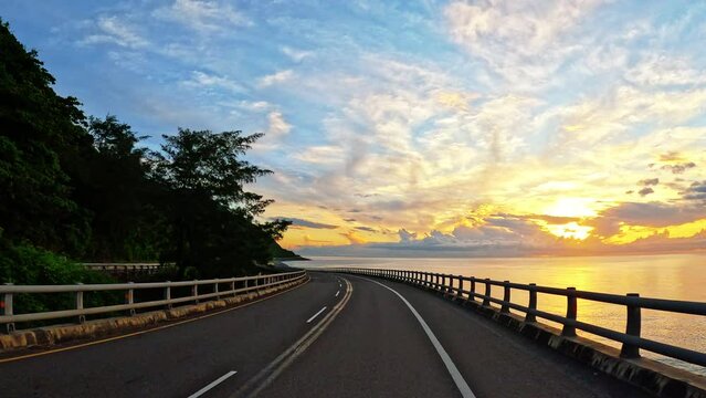 Driving into sunrise on south-link coast highway ,Taiwan.