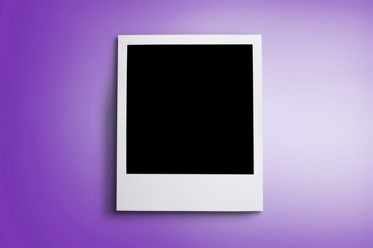 Blank photo frame on color background